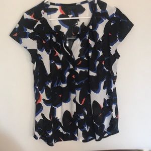 Black, white cobalt blue, and orange! Size L NWT